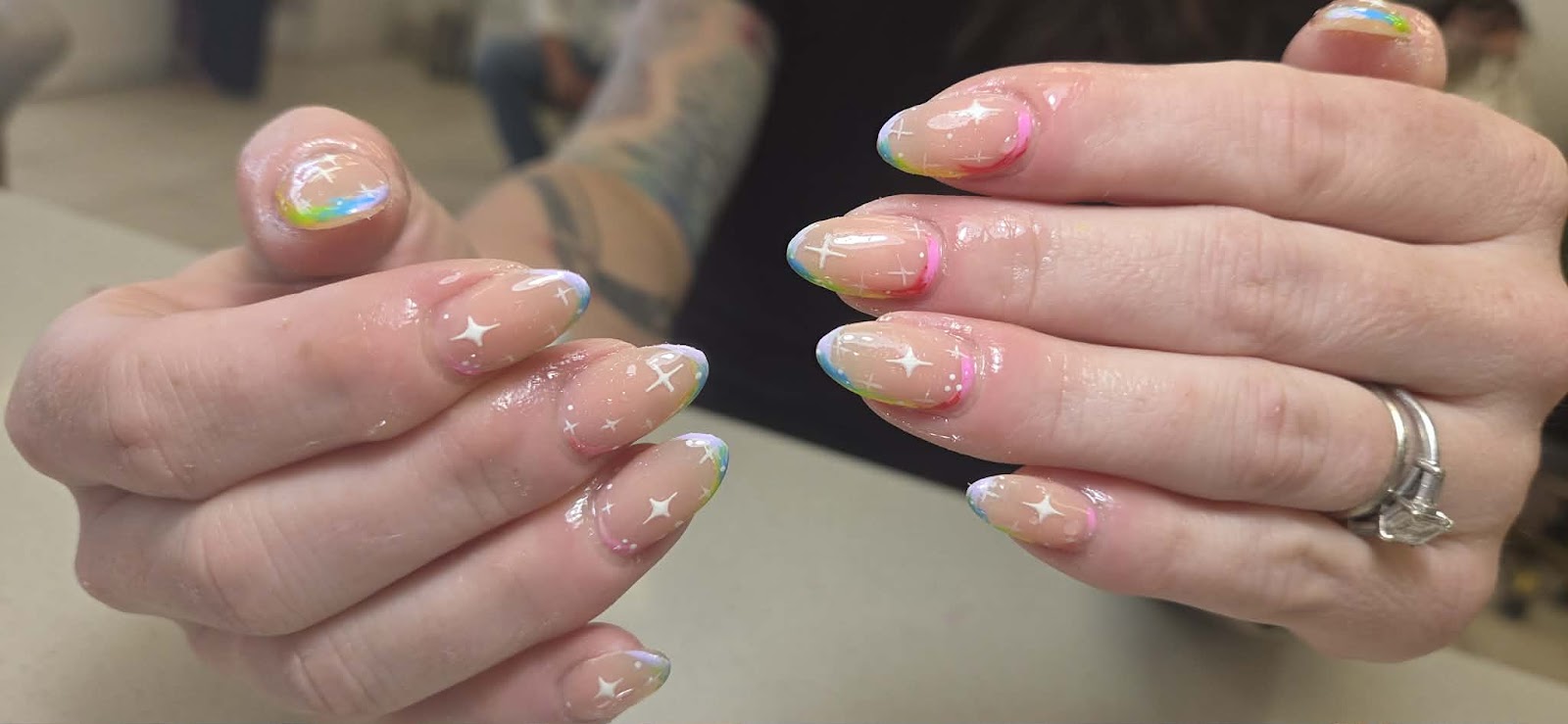 NAILS WE CARE & SPA logo